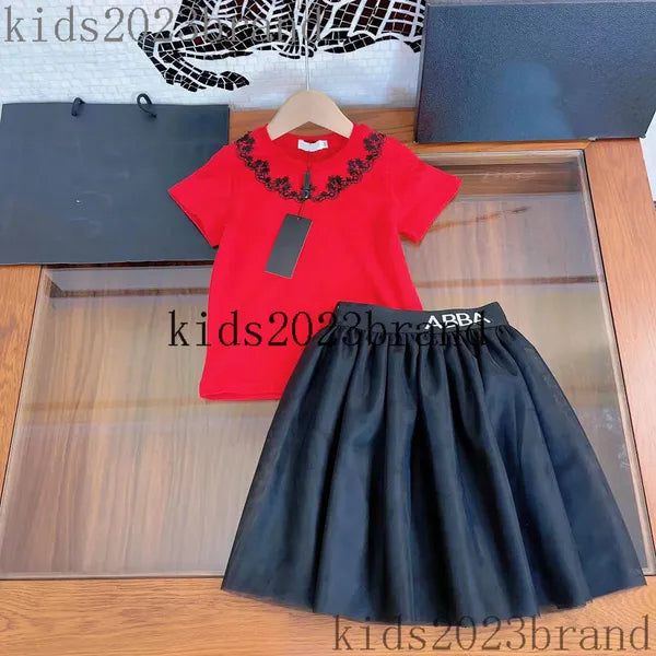 2023ss girls dress sets high end embroidery t shirts with long pleated skirts two pieces sets brand designer kids cotton t shirts white color mesh skirts flower print