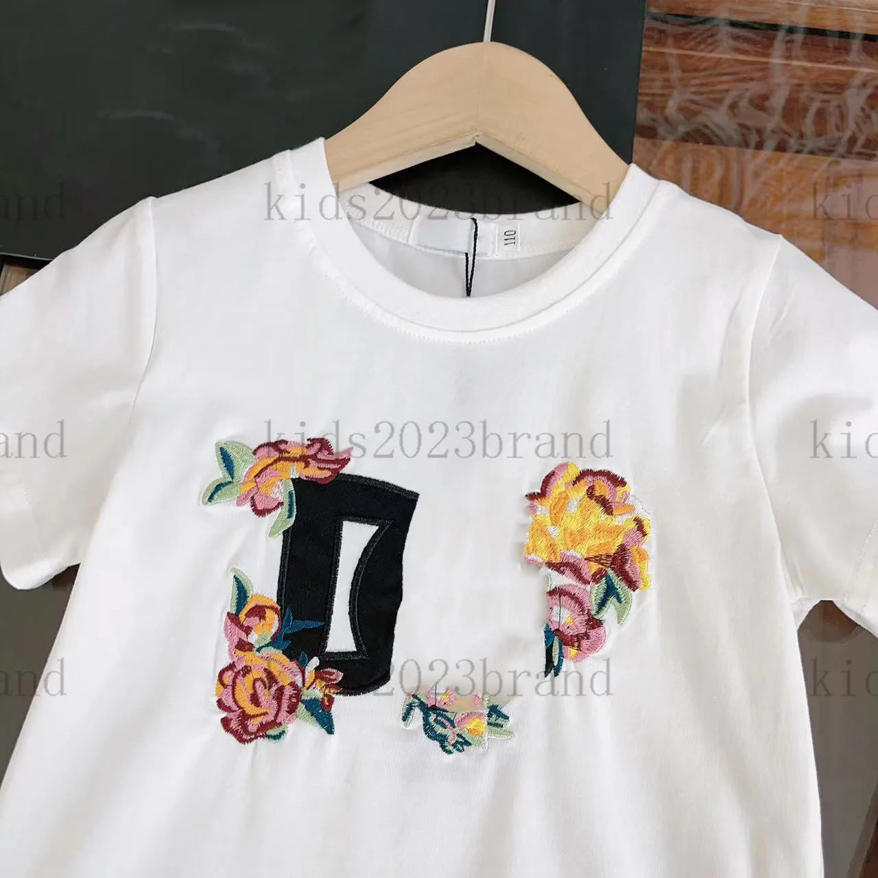 2023ss girls dress sets high end embroidery t shirts with long pleated skirts two pieces sets brand designer kids cotton t shirts white color mesh skirts flower print