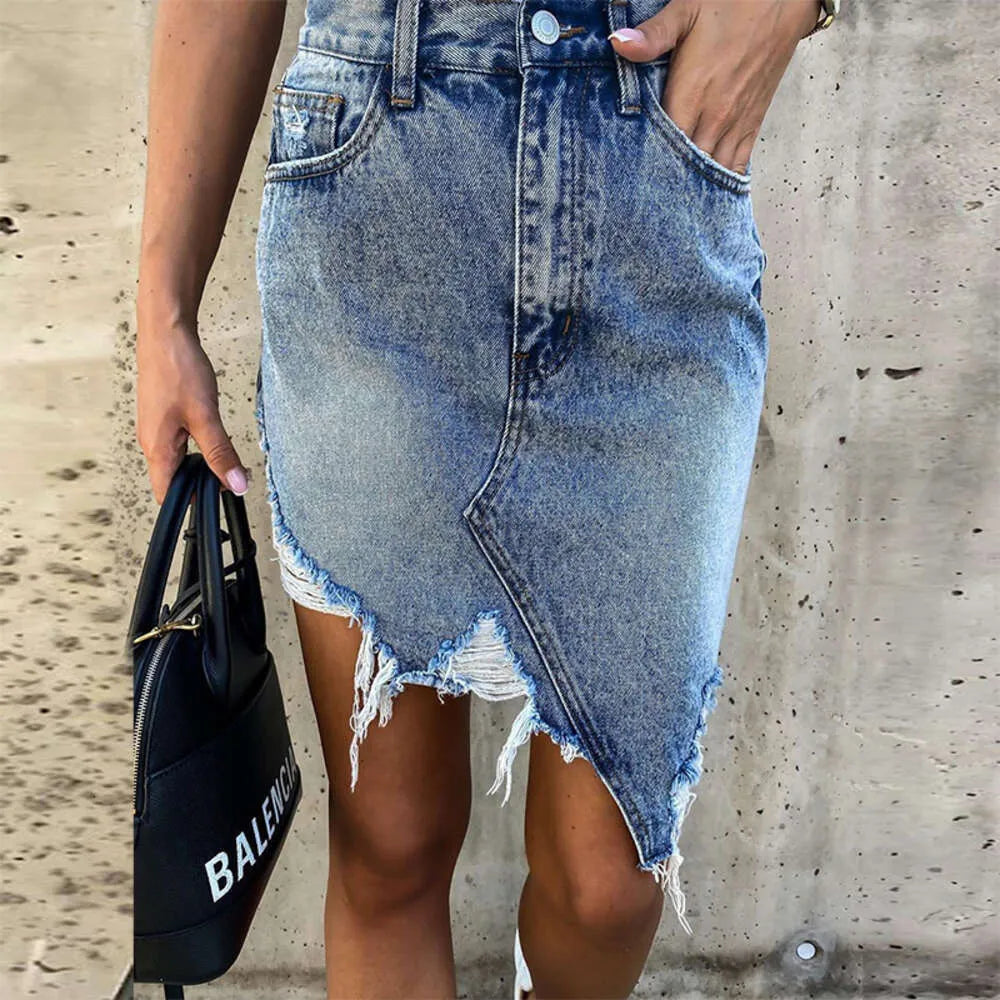 2024 Summer Casual Irregular Wrapped Hip Fringe Perforated Denim Skirt